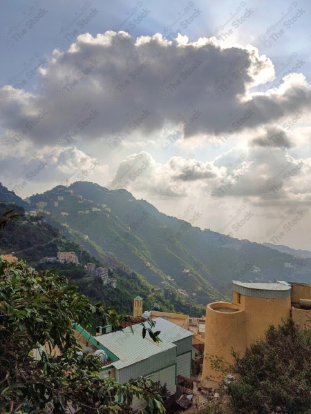 A giant cloud obscures the sun among the charming nature in Faifa Governorate in the Jizan region, south of the .Kingdom of Saudi Arabia