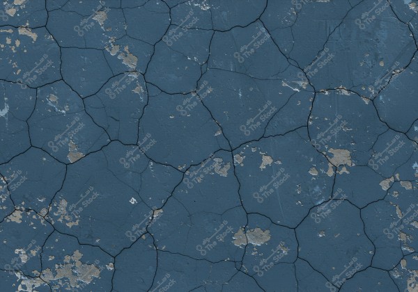 An image showing a blue, cracked surface with irregular black cracks and areas of wear, revealing a lighter previous paint color. The texture gives the impression of an aged or weathered surface.