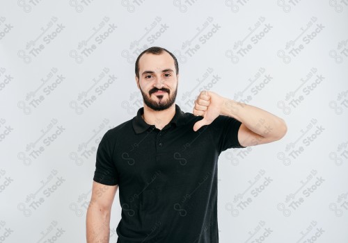 Portrait of a Saudi man on a white background making hand gestures while smiling, souvenir photos, documenting a happy moment