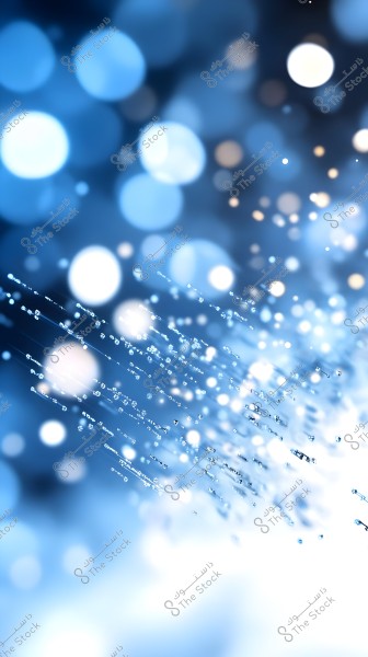 Abstract image featuring bokeh and light dots in blue and white. The image is filled with bright colors and a mysterious background, giving a sense of depth and motion.