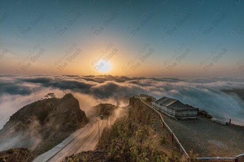 A shot showing the Black Mountain in the Jazan region in southern Saudi Arabia, a tent at the top of the mountain, historical and tourist landmarks, mountain heights, Jazan mountains, mountainous nature in Jazan