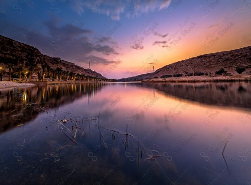 Wadi Namar Dam in Riyadh, and the sky appears almost clear during sunset