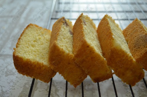 A shot of a group of lemon cake slices on a white background, bakery and pastry.