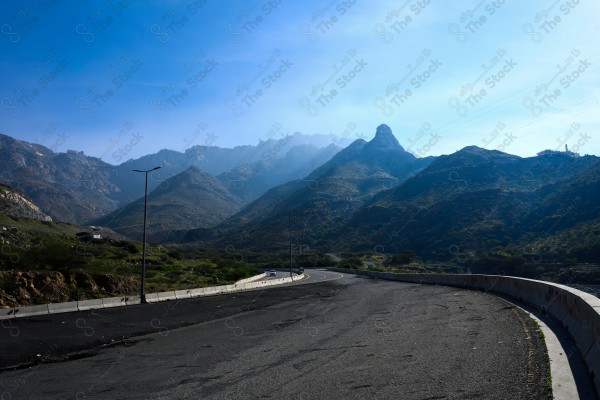 A snapshot of the paved roads of the green tail mountain range in the city of Taif, a series of rocky mountains, nature in Saudi Arabia.