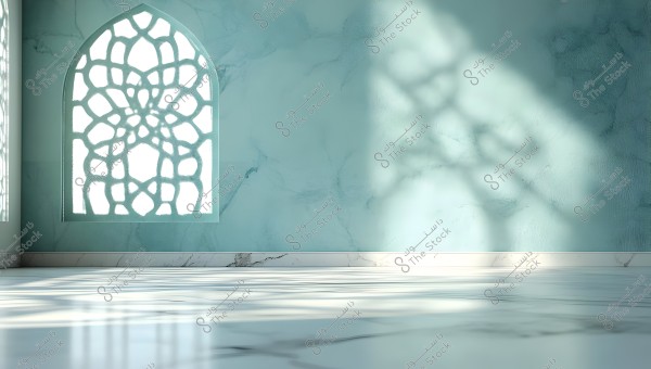 An image of a serene blue interior wall with a window featuring Islamic geometric patterns allowing light to enter. The floor is covered with glossy white marble reflecting shadows and patterns from the window.