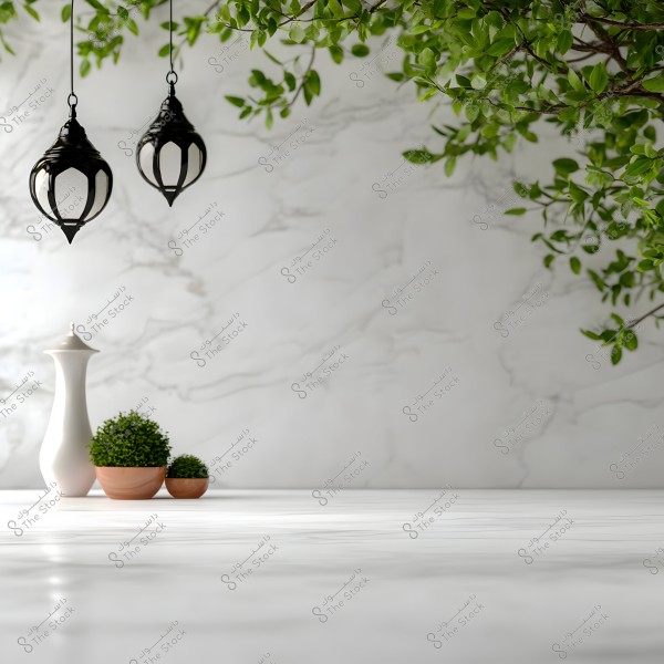 Image of a marble table with small potted plants and decorations, set against a marble-textured wall. There is also a tree branch with green leaves in the top right corner, along with hanging lamps with a metal design.