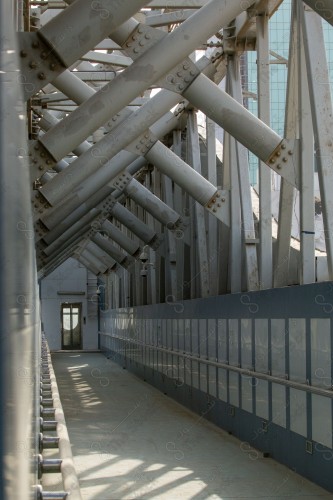 A shot of a pedestrian bridge made of steel, a pedestrian bridge on King Fahd Road in Saudi Arabia in the city of Riyadh.