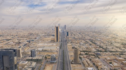 An aerial view of the capital, Riyadh, showing cloudy sky during the day, the towers in the city of Riyadh