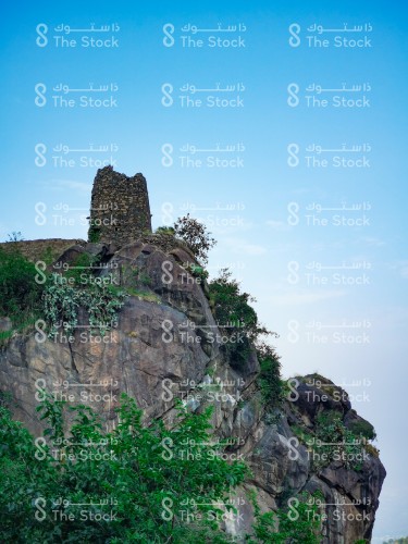 Rocky mountains and ancient buildings above them in Fayfa Governorate, Jazan region, southern Saudi Arabia