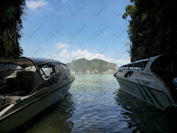 A sot for two boats surrounded by islands