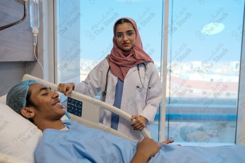 A Saudi female doctor wears a medical uniform and is examining and applying a nutrient solution, medicine and health care