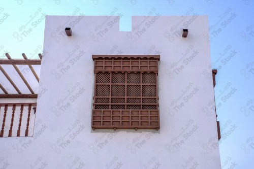 An old wooden windows in Al Qaisariah area