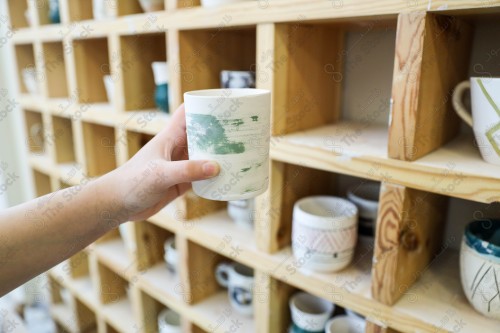 A group of pottery made by hand in the pottery workshop, pottery making