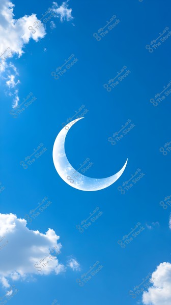 An image showing a clear blue sky with some scattered white clouds. In the center, there is a large luminous white crescent moon blending with the wispy clouds.