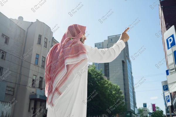 Rich arabian man\'s portrait during buying real estate, business center in city. ethnicity, culture, inclusion. confident business man in traditional wear making a deal successful. finance, economy.