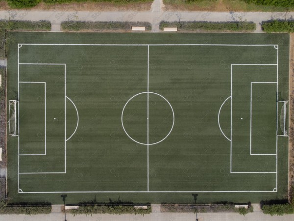 Overhead shot of a turf soccer field, green grass, stadium layout, soccer sport, sports complex.