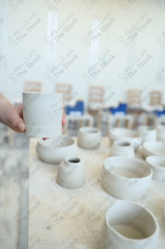 A group of pottery made by hand in the pottery workshop, pottery making