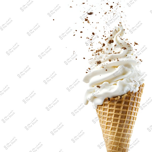 The image shows a soft serve ice cream in a waffle cone, with white ice cream topped with small chocolate bits scattered in the air. The background is white, highlighting the details of the ice cream and cone.