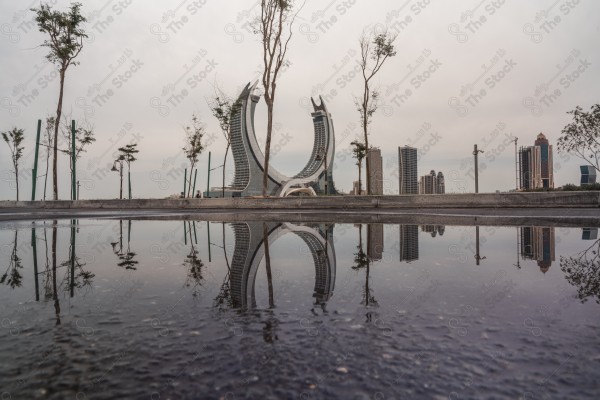 A snapshot of the towers and skyscrapers overlooking the Arabian Gulf in the Qatar region, Doha tourist attractions, tourism in Qatar, Qatar Towers, a tourist waterfront in the State of Qatar.