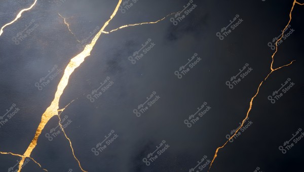 An image showing a dark background with gold cracks on the surface, resembling the traditional Japanese art style of repairing broken pottery with gold. The design adds a modern and elegant artistic touch.