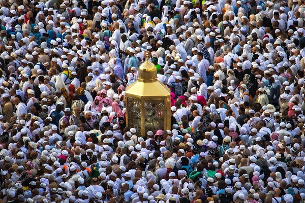 A crowd of pilgrims around Maqam Ibrahim inside the Grand Mosque in Mecca.