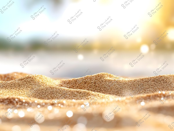 A close-up view of golden sand under bright sunlight. The sand grains are captured in fine detail, with radiant light effects giving a sense of warmth and serenity. The background is blurred, drawing attention to the intricate details of the sand.