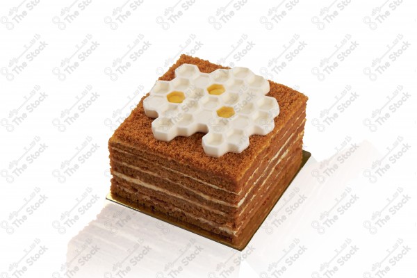 A shot of a hollow honey cake on a white background, cakes, sweets and sugar.