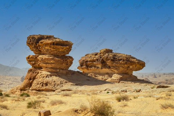 A snapshot of various rock formations from AlUla Governorate in the desert, rock layers, rocks and sand.