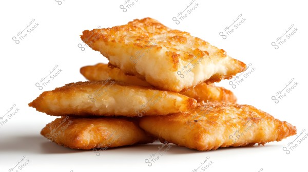 Image of a stack of square-shaped, golden-brown fried pieces placed on top of each other against a white background. The pieces appear crispy and appetizing.