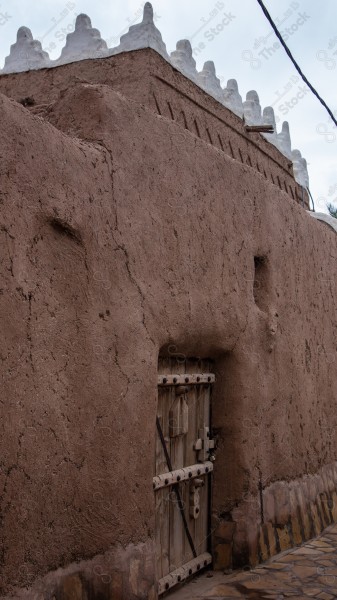 An old mud building in the heritage village of Ushaiqar