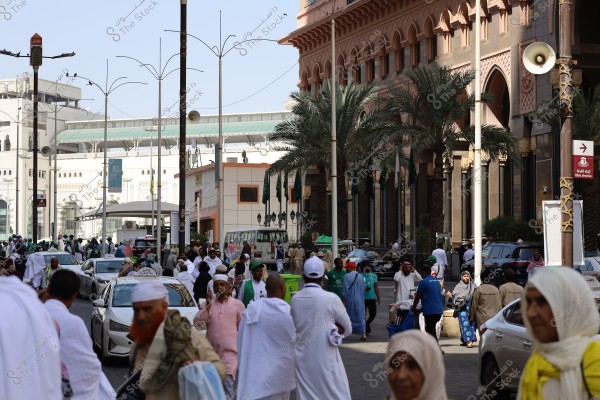 Mecca, Saudi Arabia - March 12 2025: people buying products from market shop in Mecca close to Masjid al-Haram, pilgrims umrah shopping in Makkah