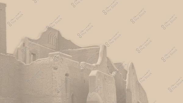 The image shows an old building with traditional architecture constructed from mud bricks. The surfaces are irregular and simply adorned, reflecting the historical architectural style of Saudi Arabia.