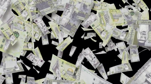 A scene from a video showing Saudi Riyal banknotes falling and scattering in the air against a black background.